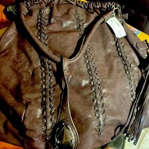 Dark brown large purse looks like leather not sure if it is or not